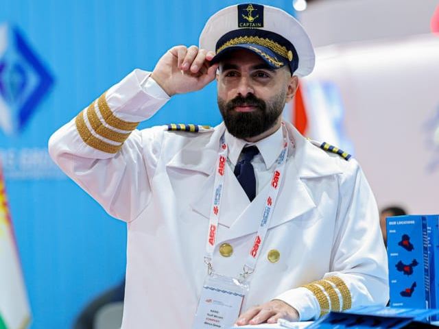 The Captain Welcomes Visitors to Our Booth